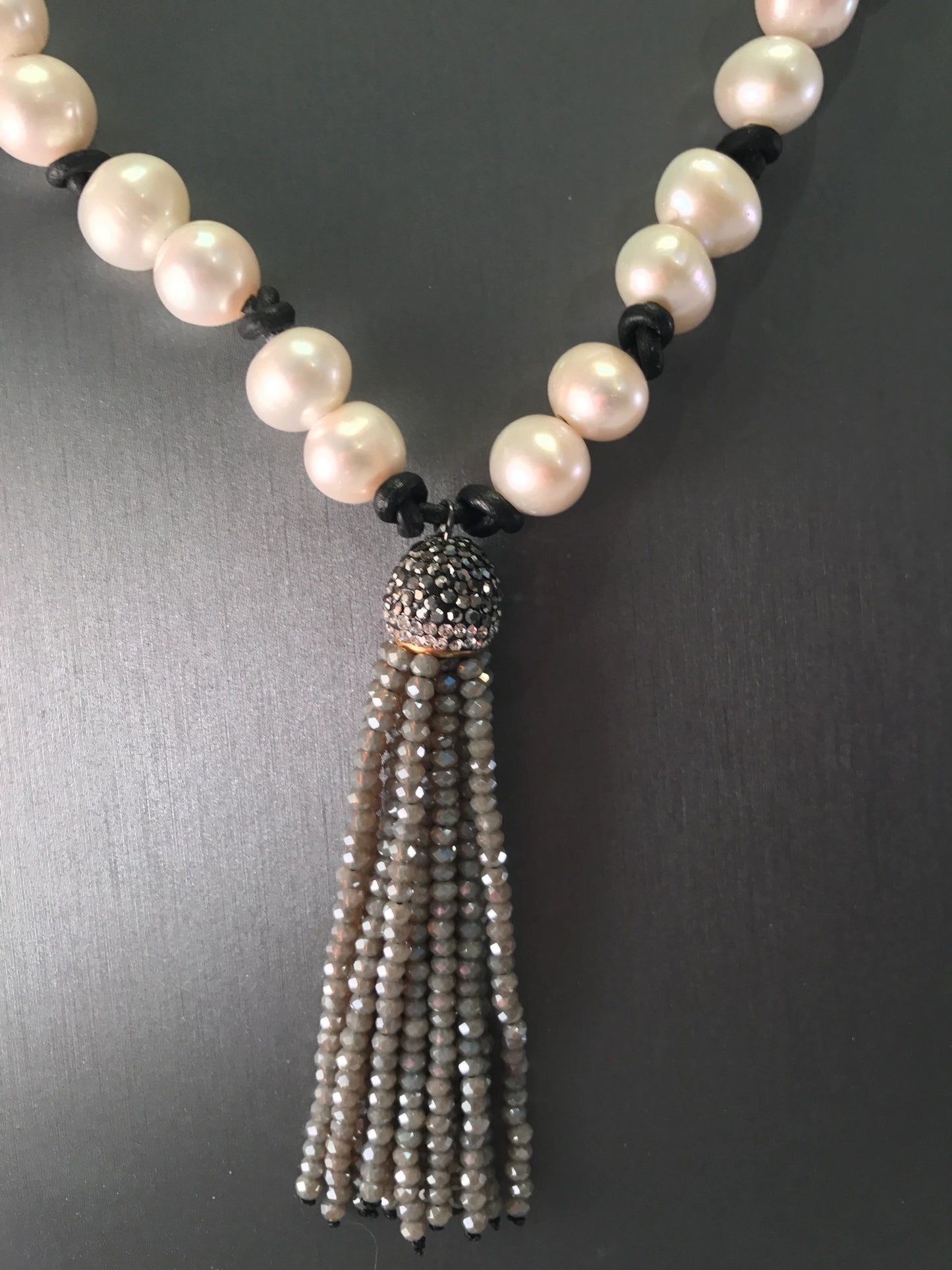 Tassel and pearl knotted long necklace Silver shown