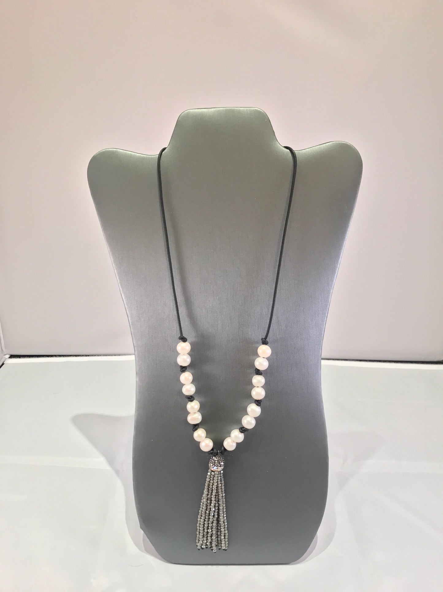 Tassel and pearl knotted long necklace Silver shown