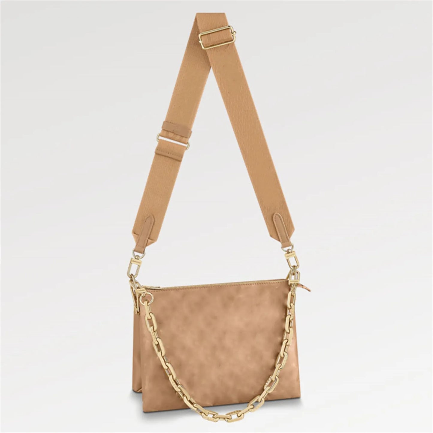 A camel color purse with a gold chain and strap, displayed against a white background.