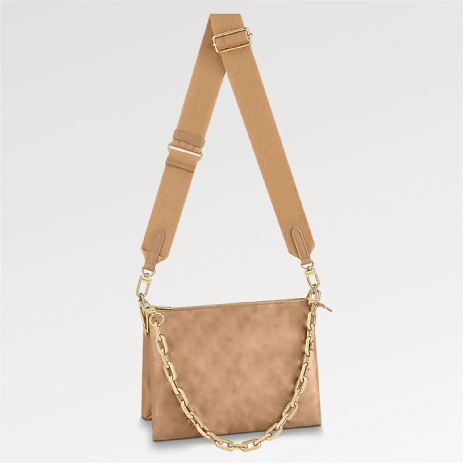 A camel color purse with a gold chain and strap, displayed against a white background.