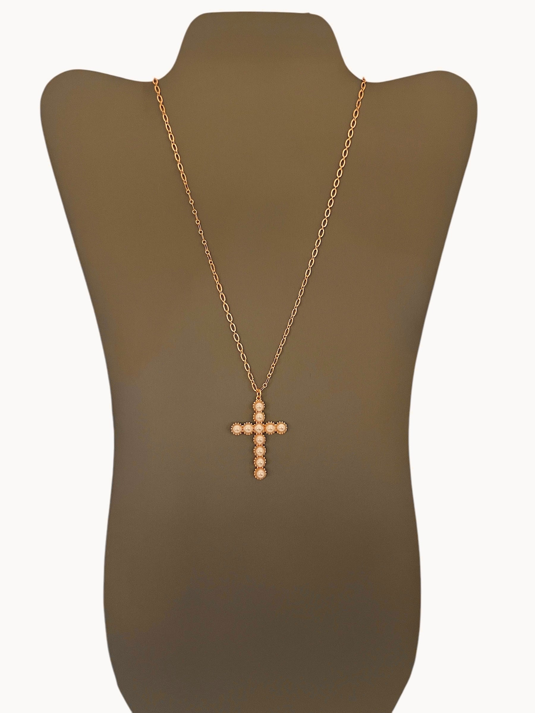 A Gold Pearl Cross Necklace displayed on a mannequin bust. The necklace features a gold-filled chain with a gold cross adorned with pearls.