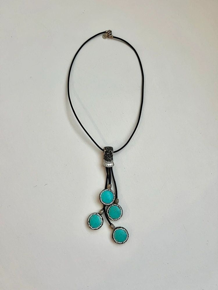 Turquoise pavé dangly necklace on leather cord with western style design